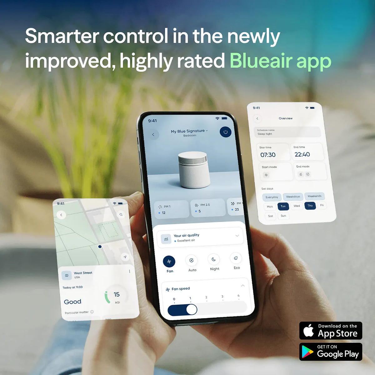 Hände halten Smartphone mit Blueair-App, Anzeige von Luftqualität, Ventilatorstufen und Zeitplan für den Blue Signature Luftreiniger